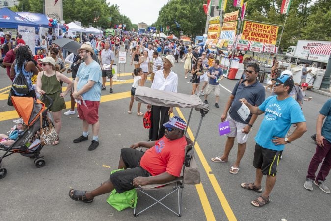 Crowds endured temperatures in the mid-nineties to listen to bands perform at the Party on the Parkway. (Jonathan Wilson for WHYY)