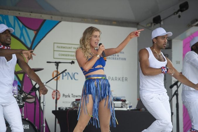 Australian Emily Perry performs on the Groove Stage. (Jonathan Wilson for WHYY)