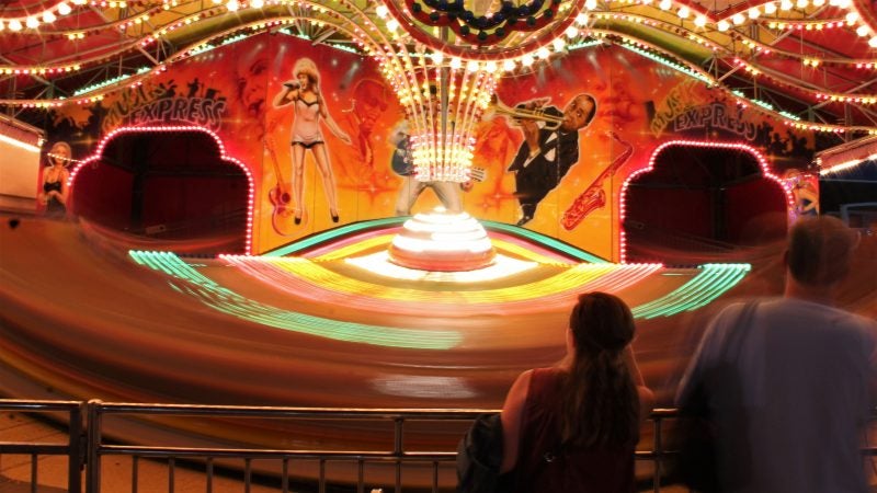 The Musik Express at Gillian’s Wonderland plays pop music while the riders speed backward and forward on the ride. (Bill Barlow/for WHYY)
