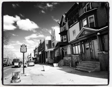 A historical marker on 33rd Street identifies the home of jazz great John Coltrane, but the house itself stands vacant and neglected.