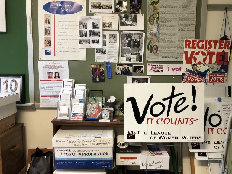 Signs inside the League of Women Voters of Delaware's Wilmington headquarters (Shirley Min/WHYY)