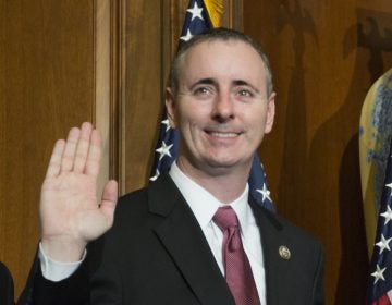 House Speaker Paul Ryan of Wis. administers the House oath of office to Rep. Brian Fitzpatrick, R-Pa., during a mock swearing in ceremony in Washington. Fitzpatrick is among his party's most strident critics of Trump's stance to Putin. (AP Photo/Zach Gibson)