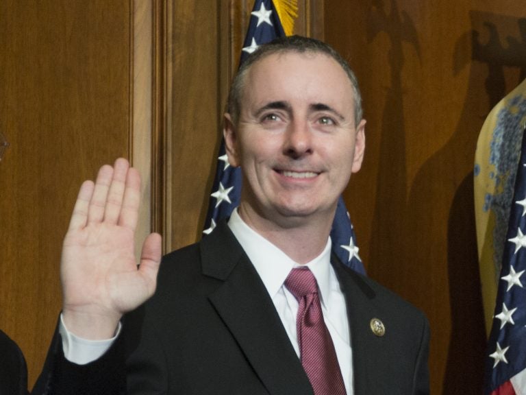 House Speaker Paul Ryan of Wis. administers the House oath of office to Rep. Brian Fitzpatrick, R-Pa., during a mock swearing in ceremony in Washington. Fitzpatrick is among his party's most strident critics of Trump's stance to Putin. (AP Photo/Zach Gibson)
