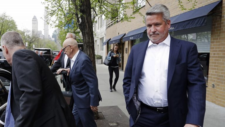 Then-Fox News co-president Bill Shine leaves a New York restaurant in April 2017 with Rupert Murdoch, executive chairman of 21st Century Fox. Shine left Fox News that May. (Mark Lennihan/AP)