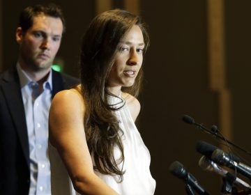 Olympic swimmer Ariana Kukors Smith talks to reporters during a May news conference in Seattle. Kukors Smith sued USA Swimming, alleging the sport's national governing body knew her former coach sexually abused her as a minor and covered it up. (Ted S. Warren/AP)