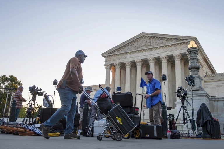 News crews set up in front of the Supreme Court early Monday morning in Washington, D.C. President Trump is expected to announce his choice for Supreme Court justice Monday evening.