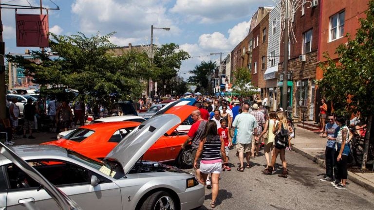 Summer visitors flock to the Passyunk Avenue car show in July.