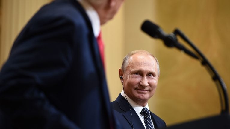 President Trump and Russia's President Vladimir Putin attend a joint press conference after a meeting in Helsinki Monday.