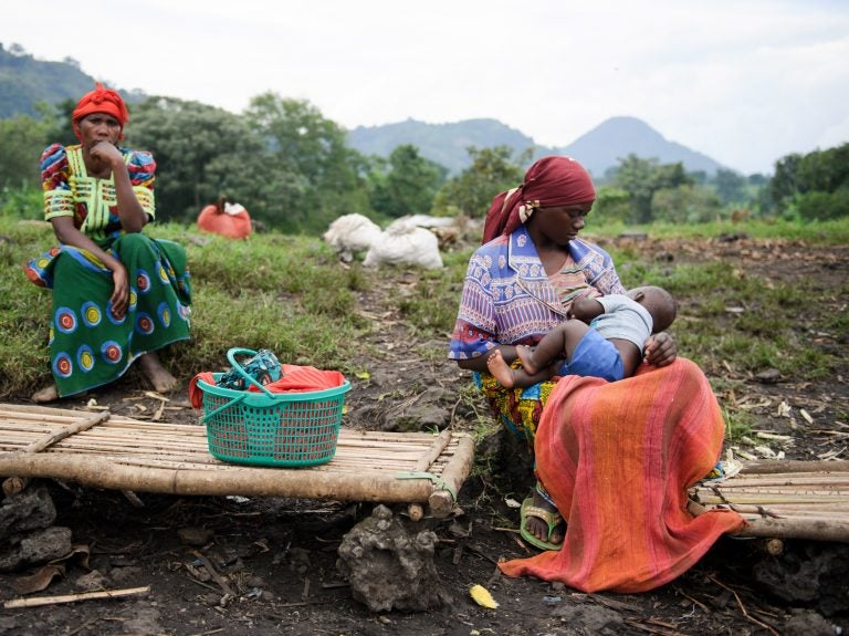 A woman breastfeeds her child in a village in the Democratic Republic of the Congo. (Phil Moore/AFP/Getty Images)