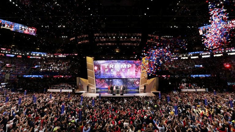 Then-candidate Donald Trump onstage with his running mate, Mike Pence, and their families at the end of the 2016 Republican National Convention in Cleveland. Republicans have chosen Charlotte, N.C., a city that hosted Democrats' convention in 2012, to host their 2020 convention. (Alex Wong/Getty Images)
