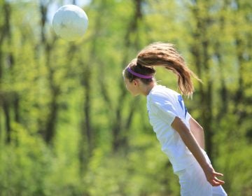 The brains of female soccer players who head the ball frequently show white matter alterations. (Krista Long/Getty Images)