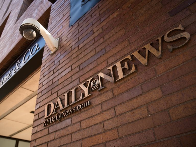 Tronc cited financial pressures in gutting the New York Daily News, a major force in local coverage. It has won Pulitzer Prizes and been a thorn in President Trump's side. (Drew Angerer/Getty Images)