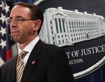 Deputy U.S. Attorney General Rod Rosenstein convened a press conference at the Justice Department on Friday. (Alex Wong/Getty Images)
