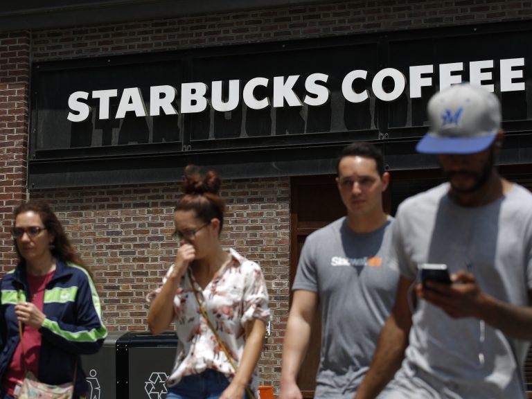 

Pedestrians walk outside the closed Spruce St. Starbucks store on May 29, 2018 in Philadelphia, Pennsylvania. (Kena Betancur/AFP/Getty Images)