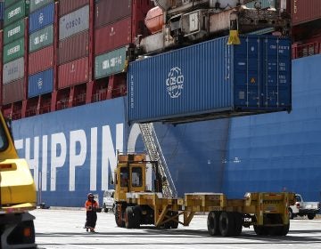 A shipping container is offloaded from the Hong Kong-based ship in Oakland, Calif., last month.
(Justin Sullivan/Getty Images)
