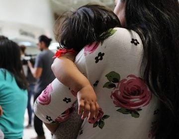 Dozens of migrant women and their children arrive at a bus station in McAllen, Texas, following their release by Customs and Border Protection last month. (Spencer Platt/Getty Images)
