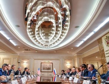 Members of a U.S. congressional delegation meet with members of the Russian Federation Council in Moscow on Tuesday. Republican senators met with Russia's Foreign Minister Sergei Lavrov on a rare visit to Moscow ahead of a summit between the countries' presidents Vladimir Putin and Donald Trump. (Yuri Kadobnov/AFP/Getty Images)