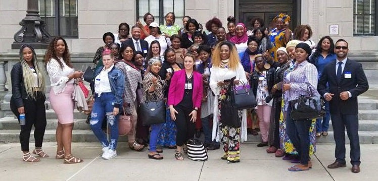 The New Jersey Hair Braiding Freedom Coalition assembles outside the the State House in Trenton before a committee hearing in May. (Courtesy of Brooke Fallon) 