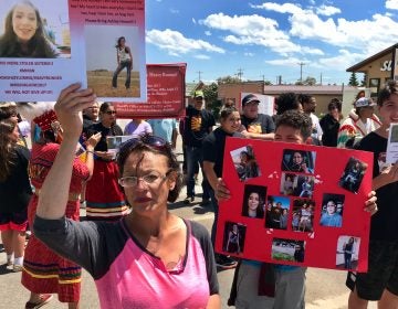 Loxie Loring walks with a group of marchers to remember her daughter, Ashley Loring, who went missing from the Blackfeet Reservation more than a year ago. (Nate Hegyi/Yellowstone Public Radio)