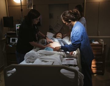 Using a mannequin to simulate dangerous scenarios, a team at Pomona Valley Hospital Medical Center learns standard treatments for obstetric emergencies like hemorrhage. (Bethany Mollenkof for NPR)