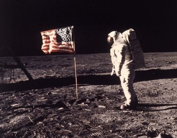 SPACE EXPLORATION, APOLLO 11 MISSION, FIRST  MAN TO LAND ON MOON, WALK ON MOON, AMERICAN ASTRONAUT WITH U.S. FLAG, SPACE SUIT, LUNAR SURFACE, FOOTPRINTS, CENTURY SHOWCASE