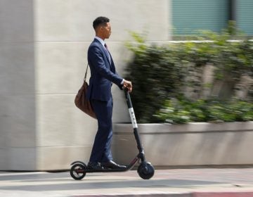 Electric scooters for rent are popping up in San Diego and other cities. Investors see a key role for them in getting from here to there. But many people find them downright annoying. (Mike Blake/Reuters)