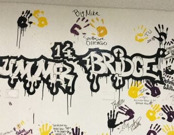 Participants from the college’s Summer Bridge program traditionally leave their mark on campus in the school colors of black, purple and gold. (Delece Smith-Barrow/ The Hechinger Report)