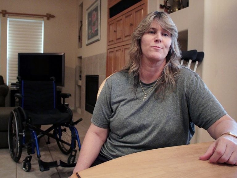 Shannon Hubbard has complex regional pain syndrome and considers herself lucky that her doctor hasn't cut back her pain prescription dosage. (Will Stone/KJZZ)

