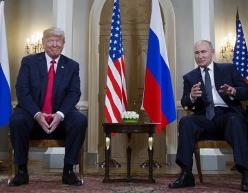 Russian President Vladimir Putin, right, makes a statement as U.S. President Donald Trump, left, looks on at the beginning of a meeting at the Presidential Palace in Helsinki, Finland, Monday, July 16, 2018. (AP Photo/Pablo Martinez Monsivais)