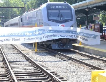 One of the new SEPTA locomotives pulls into the Chestnut Hill station. (Tom MacDonald/WHYY)