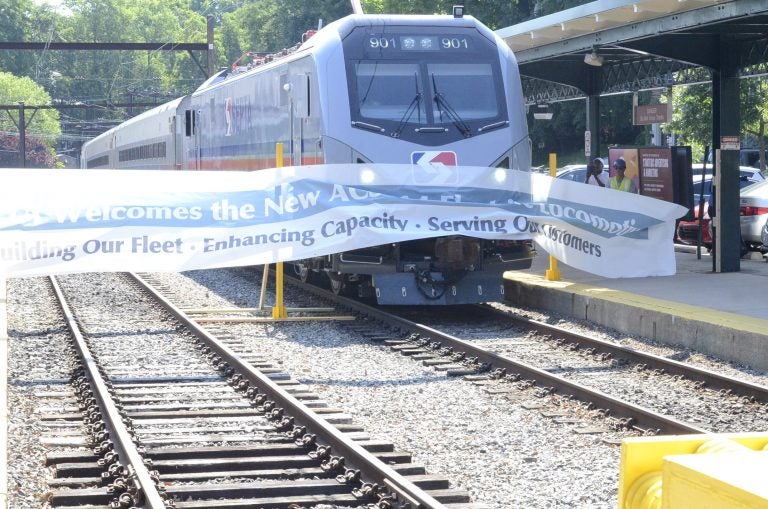 One of the new SEPTA locomotives pulls into the Chestnut Hill station. (Tom MacDonald/WHYY)