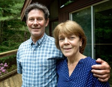 Bea and Doug Duncan outside their home in Natick, Mass. The coaching they got from the Community Reinforcement and Family Training program, they say, gave them tools to help their son Jeff stick to his recovery from drug use. He's 28 now and has been sober for nine years. (Robin Lubbbock/WBUR)