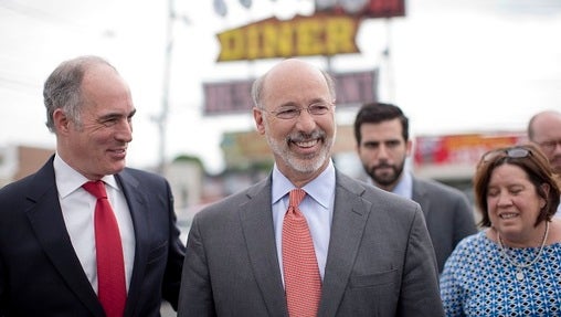 Governor Tom Wolf and US Senator Bob Casey hold comfortable leads over their GOP challengers, according to a new independent poll. (AP)