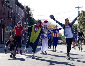 Members of Philly Roller Derby posed for photos during last year's Free Streets event, which took place on N. 5th Street. (Bastiaan Slabbers for WHYY)