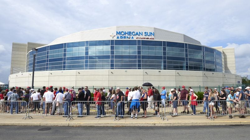 Trump supporters line up outside of the Mohegan Sun Arena in Wilkes-Barre, PA, on August 2, 2018 for the Make America Great Again rally where President Trump will headline. Trump is making a visit to endorse Lou Barletta, who is campaigning to unseat Senator Bob Casey.  (Natalie Piserchio for WHYY)