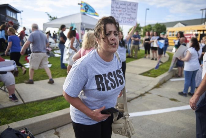 Anti-Trump protesters are found yelling at Trump Supporters during a demonstration outside of the Make America Great Again rally in Wilkes-Barre, Pa. on August 2, 2018. (Natalie Piserchio for WHYY)