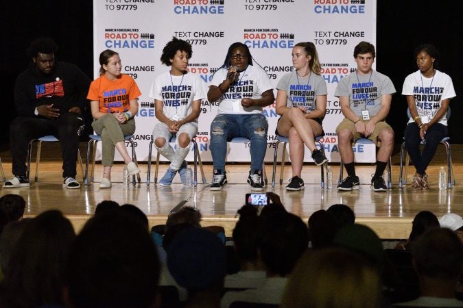 Local students from Philly (in white shirts) and New Jersey, in grey shirts, are joined by students from Parkland, FL and around the country during a March For Our Lives National Tour stop in Philadelphia, on Tuesday (Bastiaan Slabbers for WHYY)