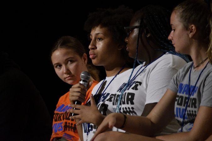 Local students from Philly (in white shirts) and New Jersey, in grey shirts, are joined by students from Parkland, FL and around the country during a March For Our Lives National Tour stop in Philadelphia, on Tuesday (Bastiaan Slabbers for WHYY)