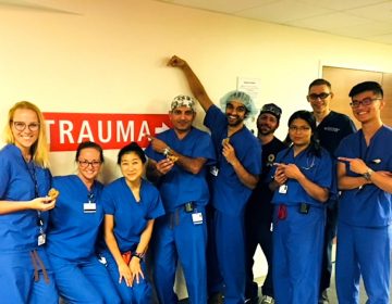 Second- year surgery resident Anna Mydlowska (far left) with her team of residents, attending physicians and nurses on the trauma unit at the Hospital of the University of Pennsylvania. (Courtesy of Anna Mydlowska)