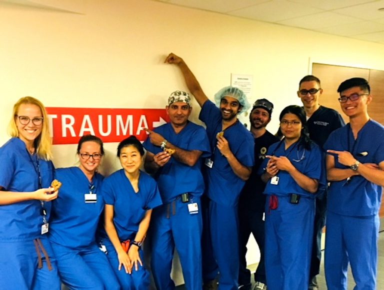 Second- year surgery resident Anna Mydlowska (far left) with her team of residents, attending physicians and nurses on the trauma unit at the Hospital of the University of Pennsylvania. (Courtesy of Anna Mydlowska)