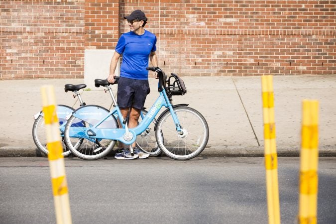 Eric Neuhaus prepares to go for a bike ride down Broad Street during the Philly Free Streets event on August 11, 2018. He says that the event is 