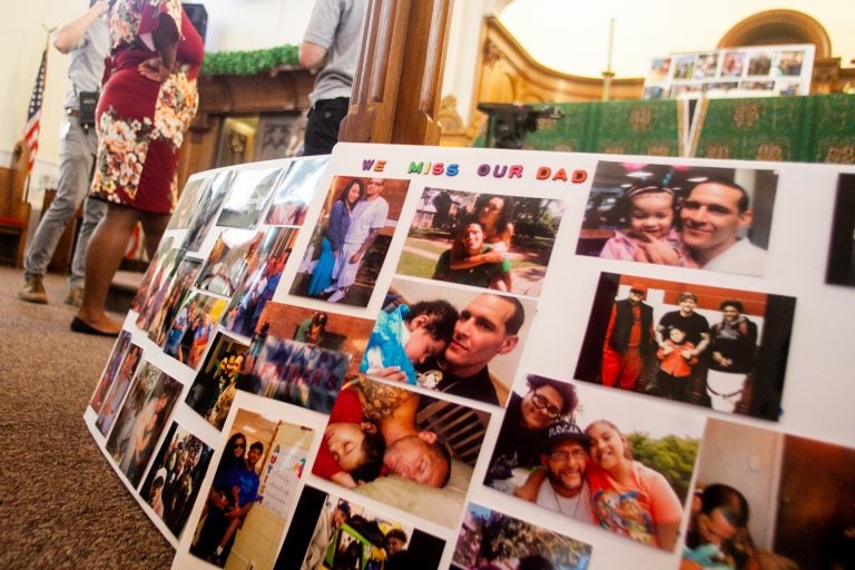 Photos of Joseph Santos and his family members were displayed at a memorial service last month for the 44-year-old who was fatally shot on July 28, 2018 by South Whitehall Township police officer Jonathan Roselle. (Brad Larrison for WHYY)