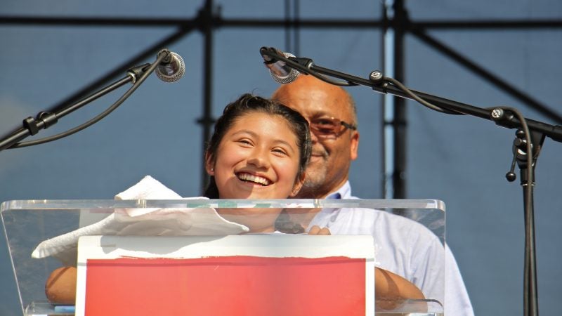 Ashley Tellez speaks of the hopes and fears of immigrant children and first-generation American children whose families might be separated by U.S. immigration policies. (Emma Lee/WHYY)