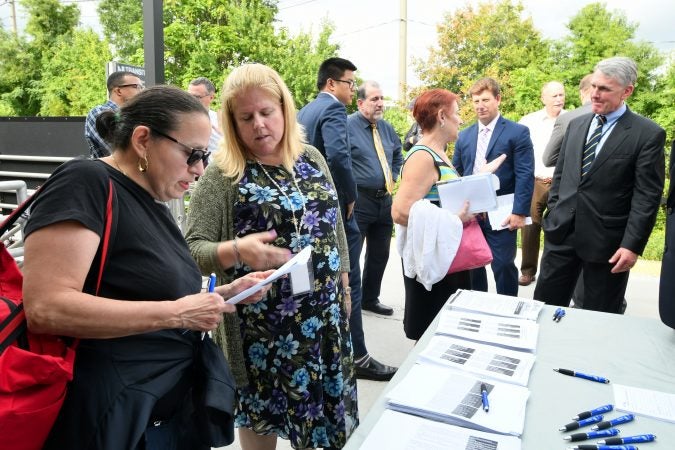 Returning from Atlantic City, Rose Delvecchio (left), of Collingswood, learned more about NJ Transit’s plan to suspend the Atlantic City line for positive train control or PTC installation. (Bastiaan Slabbers for WHYY)