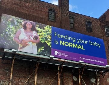 A billboard on Callowhill Street is part of Philadelphia's campaign in support of breastfeeding features a photo taken by Vanessa A. Simmons of a city woman. (Emma Lee/WHYY)