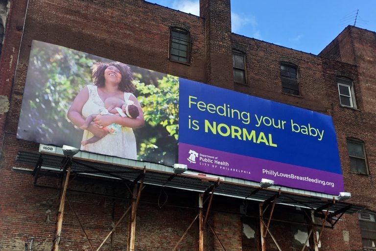 A billboard on Callowhill Street is part of Philadelphia's campaign in support of breastfeeding features a photo taken by Vanessa A. Simmons of a city woman. (Emma Lee/WHYY)