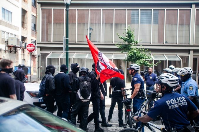 Antifa protestors were met again by a police blockade after an attempt to intercept a Blue Lives Matter march. (Brad Larrison for WHYY)