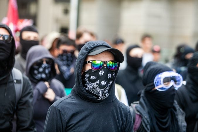 Protestors, some with the organization Antifa, marched from City Hall Saturday morning to counter a Blue Lives Matter March that began at Independence Mall. (Brad Larrison for WHYY)