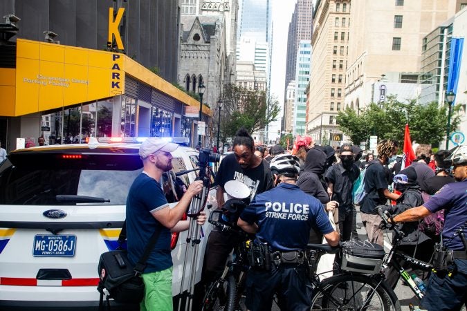 Protestors were blocked by police on Arch Street as they attempted to intercept a Blue Lives Matter March on Saturday. (Brad Larrison for WHYY)