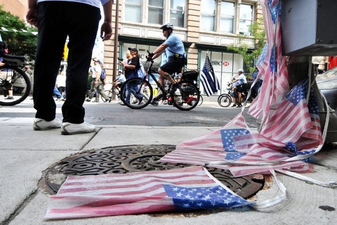 Officers on bikes escort a group of protestors at a Blue Lives Matter march as it goes over Arch Street, towards Logan Square, on Saturday. (Bastiaan Slabbers for WHYY)